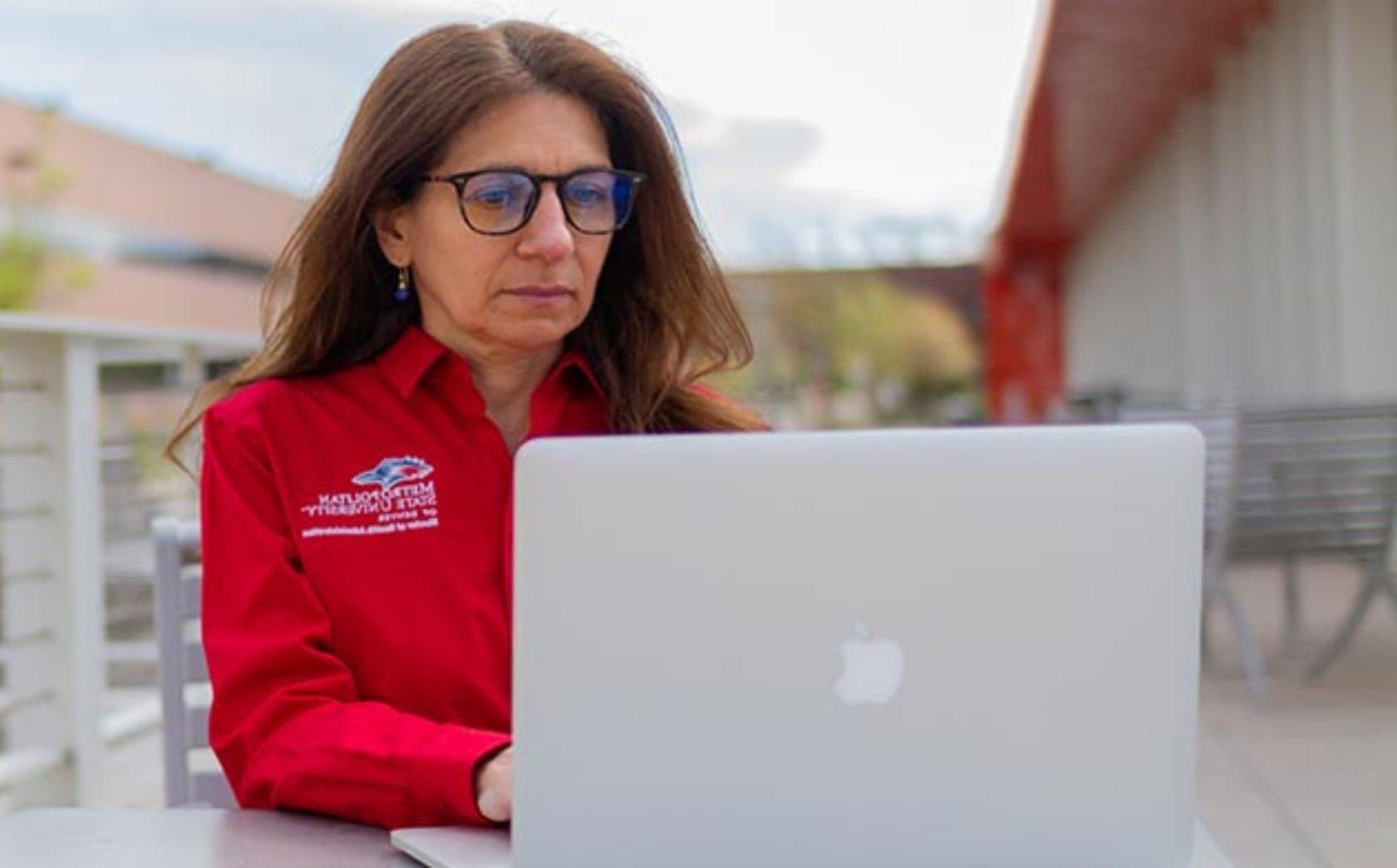 Online MSU Denver student learning outside the classroom