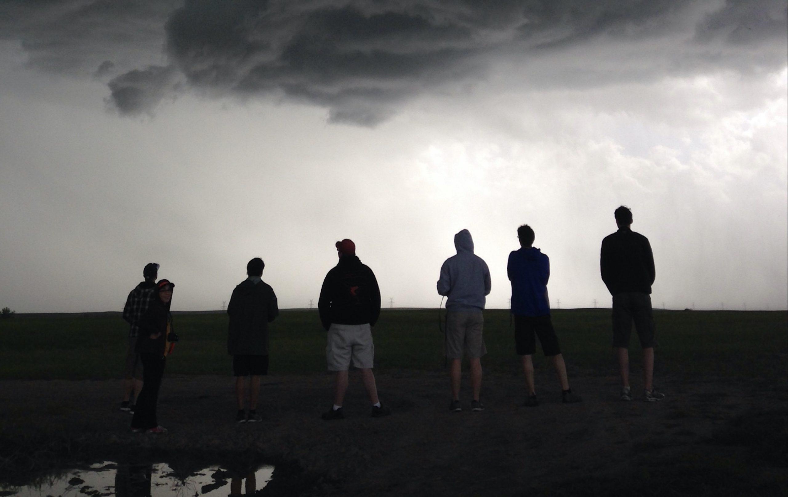 Students watching a storm