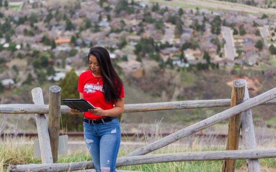 MSU Denver Online student studying remotely for a sociology major